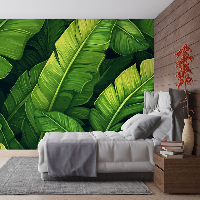 Tropical leaf wallpaper creating a luxury hotel feel in a modern living room with natural light and minimal furniture