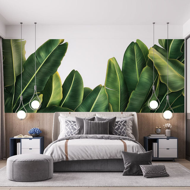 Tropical banana leaf wallpaper in modern living room with natural light showing rich emerald green tones