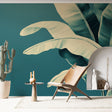 Tropical banana leaf wallpaper creating a peaceful atmosphere in a modern living room with natural light