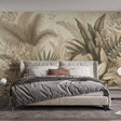 Tropical palm and monstera leaf wallpaper in beige creating a calm atmosphere in a modern living room setting