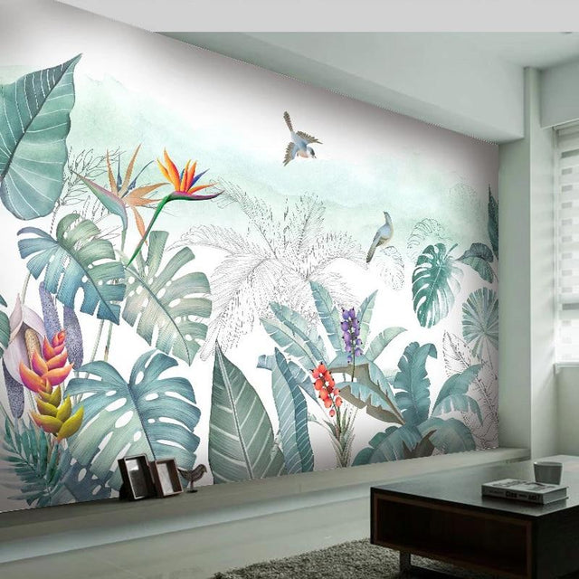 Tropical birds and monstera wallpaper creating a peaceful atmosphere in a modern living room setting
