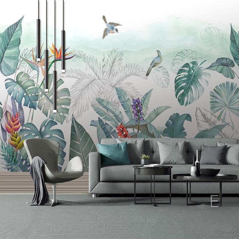 Home office space transformed with tropical paradise wallpaper showing birds in flight