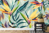 Birds of Paradise wall mural creating focal point in minimalist living room with white furniture