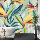 Exotic tropical wallpaper brightening home office space with orange and teal accents