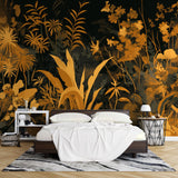 Tropical black and gold wallpaper in modern living room, golden palm leaves on dark background creating dramatic atmosphere
