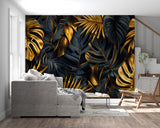 Dramatic black and gold tropical mural in restaurant setting