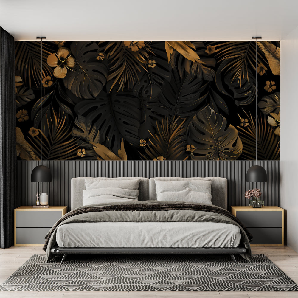 Black and gold Monstera leaf wallpaper creating drama in a modern living room with minimal furniture