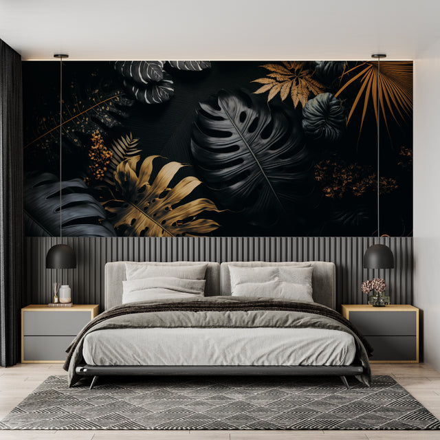 Black and gold Monstera leaf wallpaper in modern dining room with mood lighting highlighting metallic accents