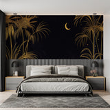 Black and gold tropical wallpaper making statement in dining room