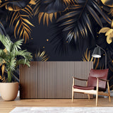 Luxury hotel lobby showcasing palm leaf mural wallpaper in black and gold finish