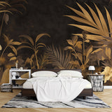 Tropical black and gold palm leaf wallpaper in modern dining room with ambient lighting showing golden details