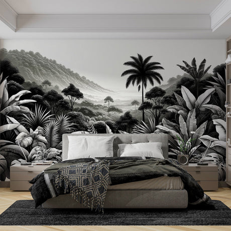 Black and white tropical jungle mural wallpaper creating depth in a modern living room with minimalist furniture