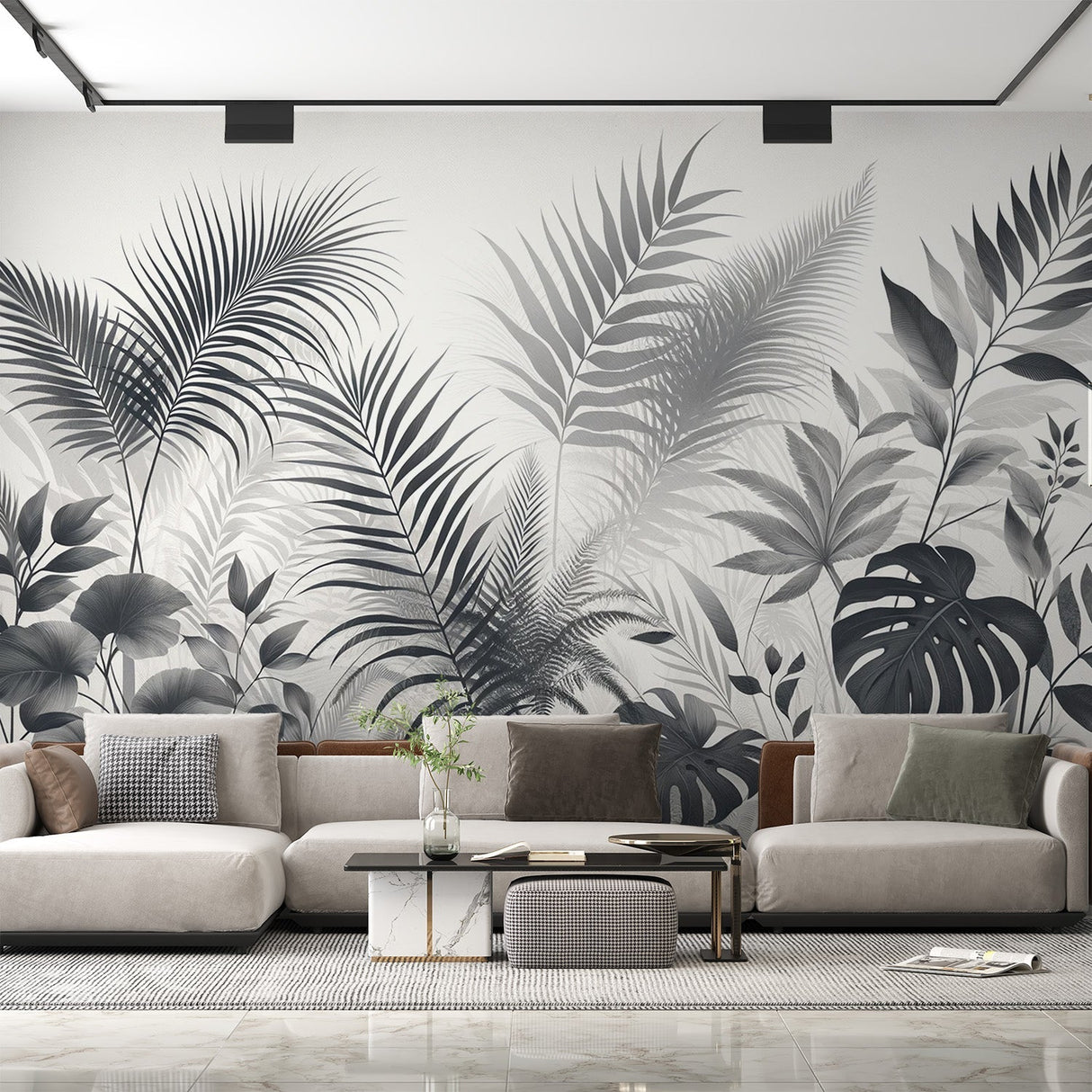 Black and white tropical leaf wallpaper creates drama in modern living room with gray sofa and natural light