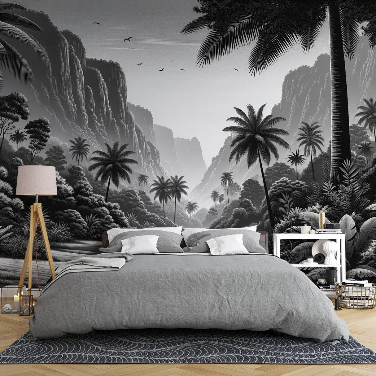 Black and white tropical mountain wallpaper mural creating depth in a modern minimalist living room with clean furniture