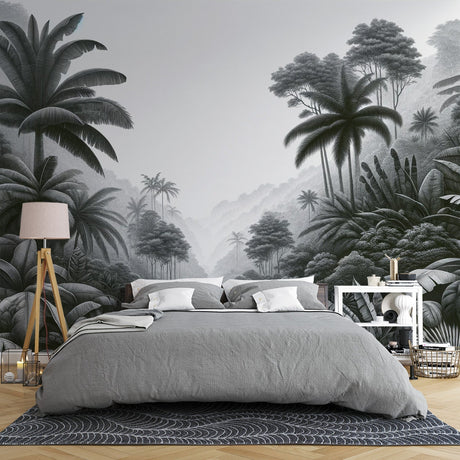 Black and white tropical forest wallpaper creating depth in a modern living room with minimalist furniture