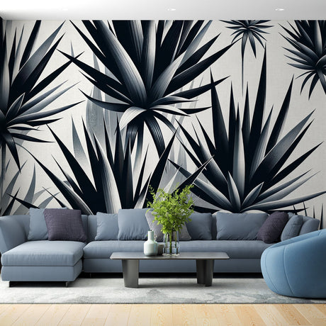Black and white tropical palm leaf wallpaper creating a stunning focal point in a modern living room with natural light