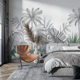 Elegant dining room featuring black and white palm leaf wall design