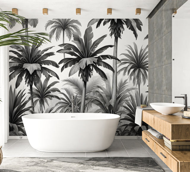 Black and white tropical palm leaf wallpaper in modern living room setting with minimalist furniture