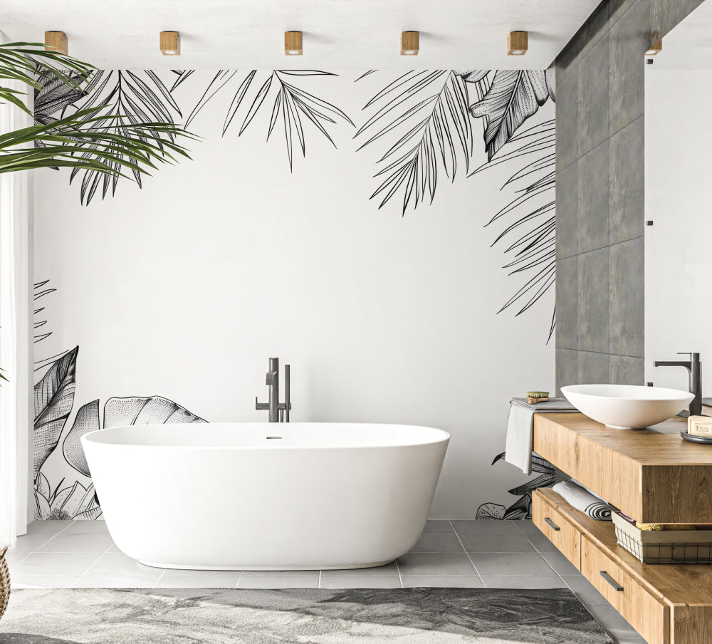 Monochrome palm leaves wallpaper creating depth in a contemporary bedroom with natural light