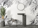 Tropical palm pattern wallpaper making a statement in a modern dining room setting