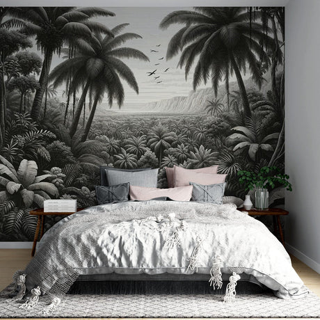 Black and white tropical palm wallpaper creating a dramatic statement wall in a modern living room with minimalist furniture