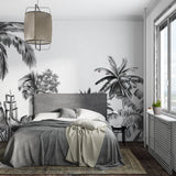 Black and white botanical mural in home office creating focused atmosphere