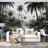 Tropical Paradise black and white mural wallpaper creating dramatic impact in modern living room with minimalist furniture