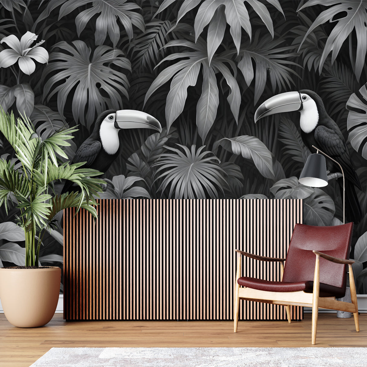 Black and white tropical wallpaper adding depth to an entrance hall