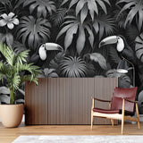 Black and white tropical wallpaper adding depth to an entrance hall