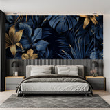 Navy and gold tropical wallpaper making a statement in master bedroom