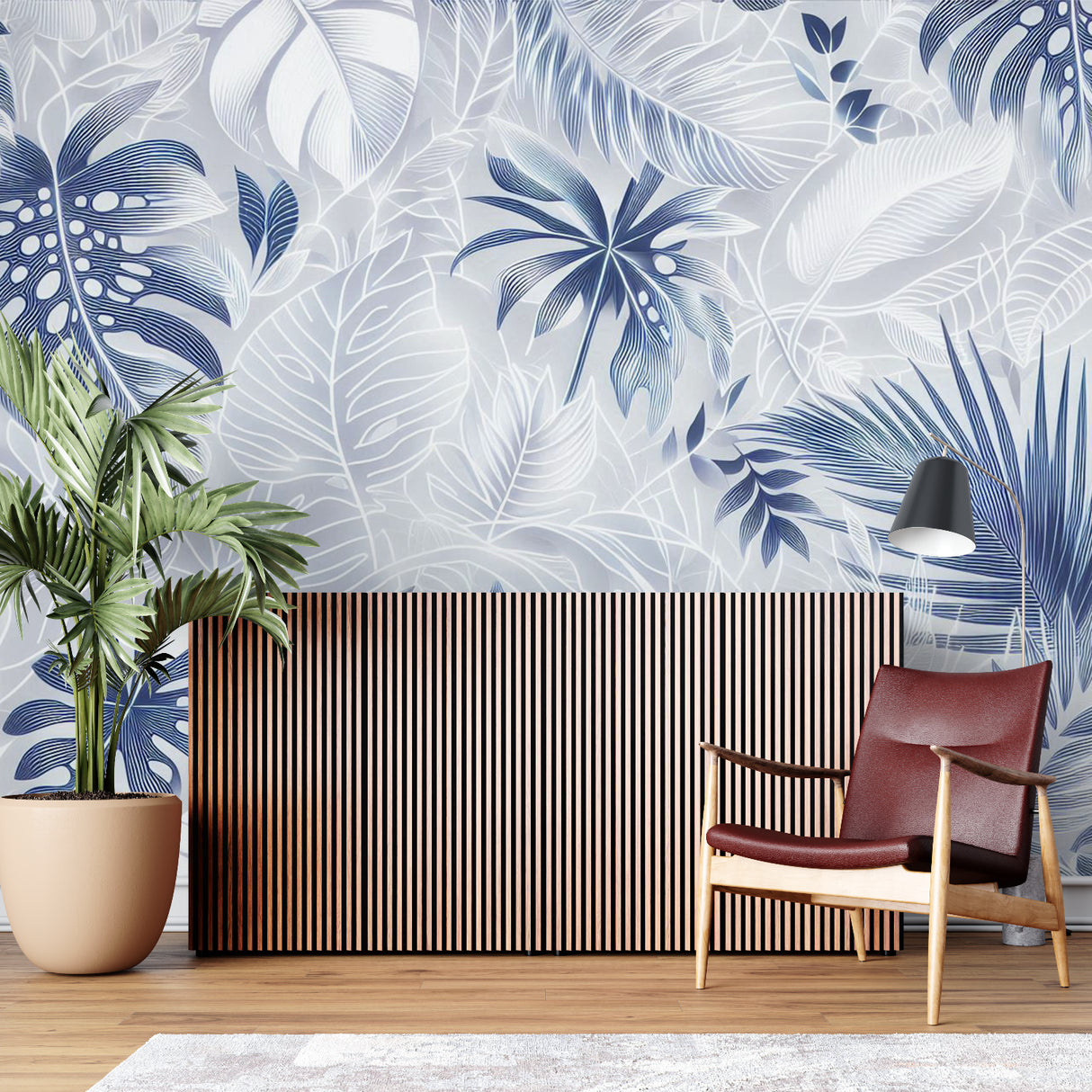 Home office with botanical blue and white leaf wallpaper bringing nature indoors