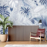 Home office with botanical blue and white leaf wallpaper bringing nature indoors