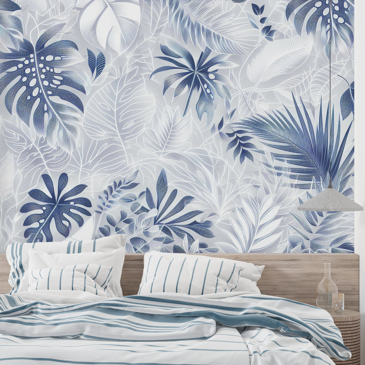 Reading nook featuring sophisticated blue Monstera leaf wall design