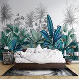 Tropical leaf wallpaper creating a fresh atmosphere in a modern living room with natural light