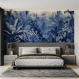 Tropical jungle wallpaper in blue creating a serene atmosphere in a modern living room