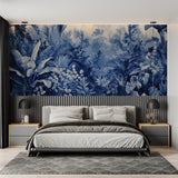 Tropical jungle wallpaper in blue creating a serene atmosphere in a modern living room