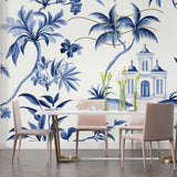 Tropical palm tree wallpaper with Mediterranean villa in a modern living room, creating a fresh coastal atmosphere
