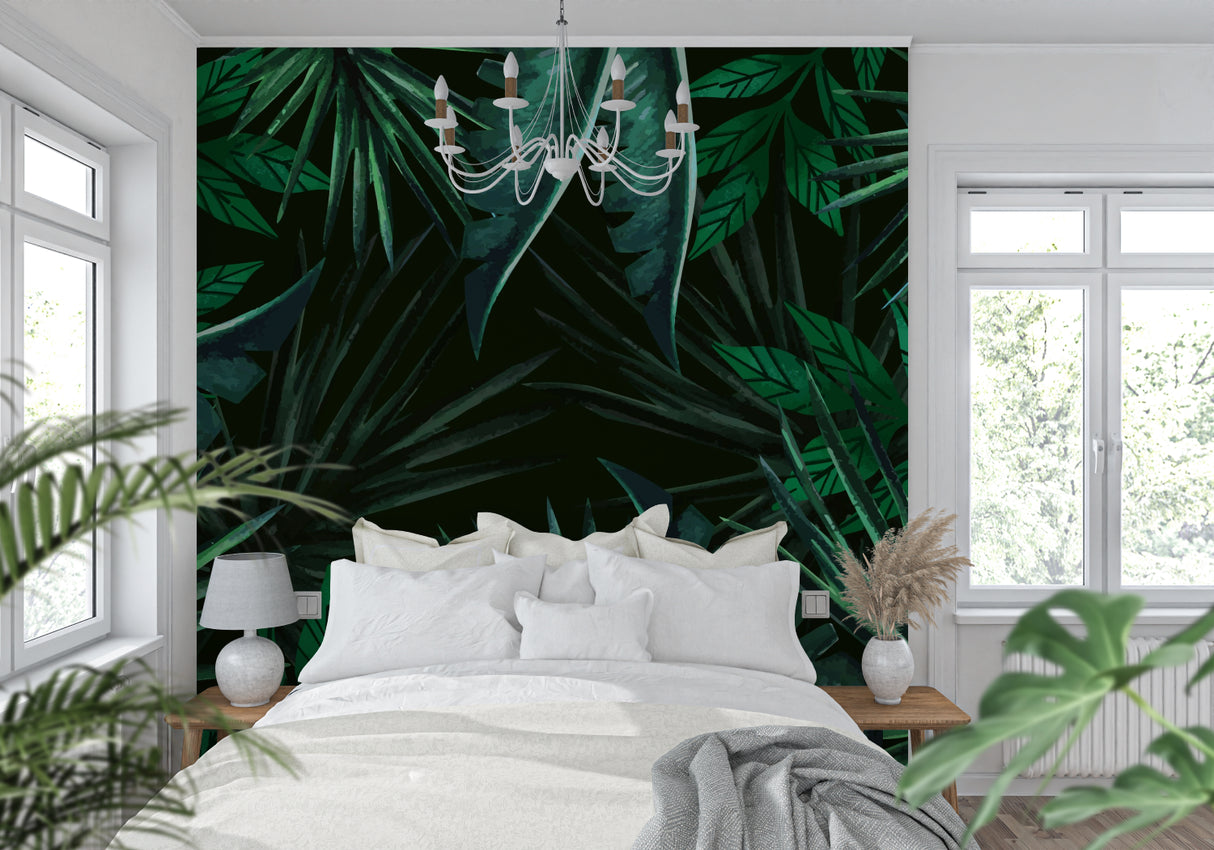 Dark green tropical leaf mural in a bedroom setting with natural light
