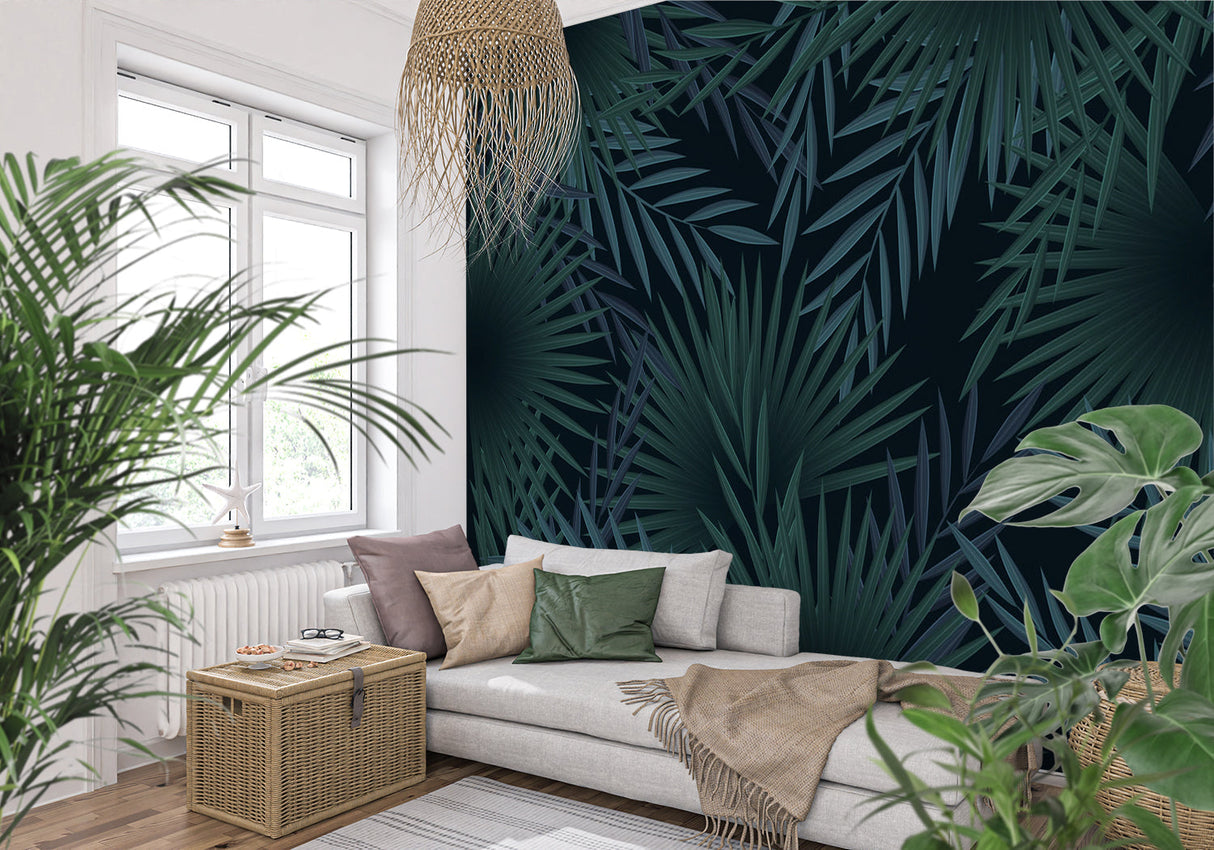 Tropical palm leaf wallpaper in modern living room creating a bold statement wall with deep green botanical pattern