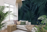 Tropical palm leaf wallpaper in modern living room creating a bold statement wall with deep green botanical pattern