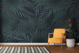 Dark green palm leaves mural in bedroom showing dramatic botanical print against white furniture