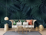 Palm leaf wallpaper creating depth in dining room with modern furniture and lighting