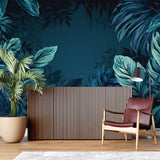 Jungle foliage mural in deep teal making a statement in a dining room setting