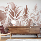 Tropical botanical wallpaper in dusky rose tones creating a serene atmosphere in a modern living room with natural light