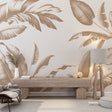 Tropical banana leaf wallpaper in beige creating a calm and sophisticated atmosphere in a modern living room