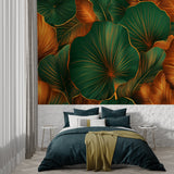 Tropical leaf wallpaper in modern living room showing emerald green and gold pattern creating depth