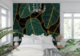 Master bedroom with elegant emerald and gold tropical wall mural creating luxury feel