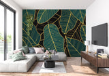 Home office featuring botanical wallpaper with gold palm leaves on emerald background