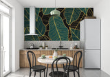 Dining room with tropical leaf pattern wallpaper showing scale and metallic details