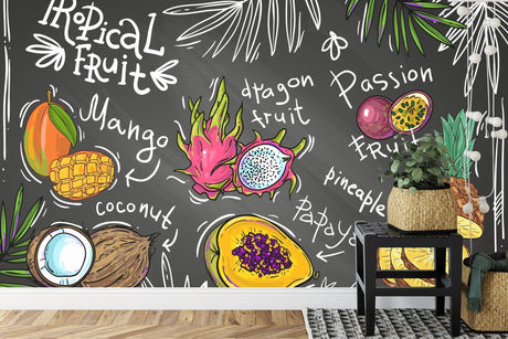 Tropical fruit wallpaper bringing fresh market vibes to modern kitchen with black chalkboard background